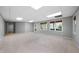 Finished basement with carpet flooring, recessed lights and a door leading to the exterior at 2883 Observation Nw Pt, Marietta, GA 30064