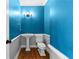 Powder room with hardwood floors, toilet, and a pedestal sink at 2883 Observation Nw Pt, Marietta, GA 30064