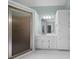 Bathroom featuring a glass-enclosed shower, white cabinets, and tile floors at 2883 Observation Nw Pt, Marietta, GA 30064