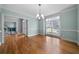 Dining room featuring hardwood floors, large window and neutral paint at 2883 Observation Nw Pt, Marietta, GA 30064