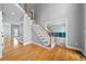 Foyer featuring hardwood floors and a staircase leading to the upper level at 2883 Observation Nw Pt, Marietta, GA 30064