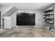 Spacious garage area with a large storage cabinet and utility shelves at 2883 Observation Nw Pt, Marietta, GA 30064