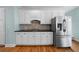 Kitchen featuring white cabinets, stainless steel refrigerator and granite countertops at 2883 Observation Nw Pt, Marietta, GA 30064