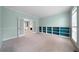 Bright living room features built-in shelving, crown molding, and glass French doors at 2883 Observation Nw Pt, Marietta, GA 30064