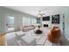 Bright and airy living room with fireplace, built-in shelves, and lots of natural light at 2883 Observation Nw Pt, Marietta, GA 30064