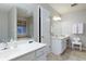 Clean bathroom with double sink vanity, soaking tub, separate toilet, and ample counter space at 4030 Crescent Walk Ne Ln, Suwanee, GA 30024