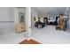 Spacious living room with plush carpeting, fireplace, and an abundance of natural light at 4030 Crescent Walk Ne Ln, Suwanee, GA 30024