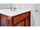 Bathroom with white countertops and wooden cabinets at 4874 Seldon Se Way, Smyrna, GA 30080