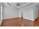 Spacious bedroom featuring hardwood floors, tray ceilings, recessed lights and closet at 4874 Seldon Se Way, Smyrna, GA 30080