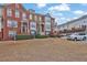 Attractive townhomes with well-kept lawns, showcasing the inviting neighborhood setting and curb appeal at 4874 Seldon Se Way, Smyrna, GA 30080