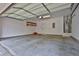Spacious garage with ample storage space, shelving and water heater at 4874 Seldon Se Way, Smyrna, GA 30080