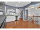 Bright kitchen features stainless steel appliances, granite countertops and hardwood floors at 4874 Seldon Se Way, Smyrna, GA 30080