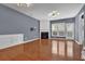 Light-filled living room featuring fireplace, hardwood floors, and access to the outdoor space at 4874 Seldon Se Way, Smyrna, GA 30080