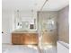Elegant bathroom featuring a glass shower enclosure, double vanity with marble countertop, and marble floors at 555 Orme Ne Cir, Atlanta, GA 30306
