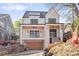 Striking two-story modern home with a covered porch, distinctive black-framed windows, and a convenient two-car garage at 555 Orme Ne Cir, Atlanta, GA 30306