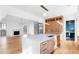 Well-appointed kitchen features marble countertops, stainless steel fixtures, and seamless flow to a cozy living room at 555 Orme Ne Cir, Atlanta, GA 30306