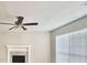 Bright living room with a fireplace and large window at 738 Windsor Cir, Lawrenceville, GA 30046