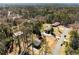 Birds eye view of the property, surrounded by lush, mature trees and landscaping at 2941 Foothill Trl, Marietta, GA 30066