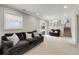 Comfortable living room with neutral carpet and walls, leading to the lower level at 2941 Foothill Trl, Marietta, GA 30066