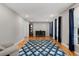 Bright living room with hardwood floors, an area rug, neutral walls, and natural light at 2941 Foothill Trl, Marietta, GA 30066