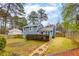 A spacious backyard with lush greenery and mature trees at 1341 Inman Ct, Norcross, GA 30093