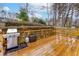 Large wooden deck perfect for outdoor gatherings, complete with a grill at 1341 Inman Ct, Norcross, GA 30093