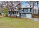 Charming two-story home with a welcoming front porch and attached garage at 1341 Inman Ct, Norcross, GA 30093