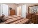Bedroom featuring carpet, crown molding and ample closet space at 159 Tara Blvd, Loganville, GA 30052