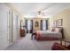 Cozy bedroom featuring carpet, natural light and neutral walls at 159 Tara Blvd, Loganville, GA 30052