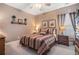 Cozy bedroom with carpet, crown molding and ample closet space at 159 Tara Blvd, Loganville, GA 30052