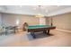 Finished basement game room with pool table, card table, and neutral carpet at 159 Tara Blvd, Loganville, GA 30052