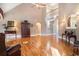 Light filled living room with hardwood floors, second story, and views to other rooms at 159 Tara Blvd, Loganville, GA 30052