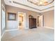Main bedroom featuring trey ceilings, neutral walls and carpeted floors at 159 Tara Blvd, Loganville, GA 30052