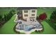 Backyard with a pool, hot tub, outdoor seating and dining areas, professional landscaping, and a two-story deck at 4440 Croftshire Pl, Cumming, GA 30040