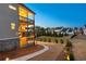 Spacious home featuring multiple decks with string lights and a large landscaped backyard at 4440 Croftshire Pl, Cumming, GA 30040