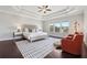 Comfortable main bedroom with modern decor and large windows for natural light and neighborhood views at 4440 Croftshire Pl, Cumming, GA 30040