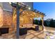 Outdoor pergola featuring a seating area and string lights at 4440 Croftshire Pl, Cumming, GA 30040