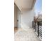 Balcony with black railings, and outdoor furniture perfect for relaxing and taking in the neighborhood at 455 Glen Iris Ne Dr # D, Atlanta, GA 30308