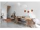 Bright dining space with modern decor, an adjacent staircase, and plenty of natural light at 455 Glen Iris Ne Dr # D, Atlanta, GA 30308