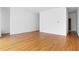 Spacious living room featuring hardwood floors and neutral walls, creating a bright and inviting atmosphere at 455 Glen Iris Ne Dr # D, Atlanta, GA 30308