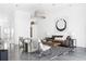 Inviting living room with a unique lighting fixture, contemporary art, and polished concrete floors at 455 Glen Iris Ne Dr # D, Atlanta, GA 30308
