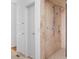 Walk-in shower featuring stone tile, rainfall shower head, and a built-in niche at 455 Glen Iris Ne Dr # D, Atlanta, GA 30308