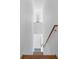 Modern stairwell with wood steps and white walls and a natural wood handrail at 455 Glen Iris Ne Dr # D, Atlanta, GA 30308