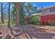 Backyard featuring private deck, mature trees, and a large yard space at 1050 Wedgewood Ln, Tucker, GA 30084