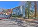 Two-story townhouse featuring siding, multiple windows, and parking at 1050 Wedgewood Ln, Tucker, GA 30084