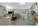 Open-concept living room featuring wood floors, fireplace, comfortable seating, and natural light at 1050 Wedgewood Ln, Tucker, GA 30084