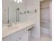 Bright bathroom featuring a white vanity, ample counter space, and a shower/tub combo at 1413 Eastbrooke Way, Marietta, GA 30066