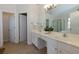 Elegant bathroom featuring double sinks, tile flooring, and a separate shower and bath at 1413 Eastbrooke Way, Marietta, GA 30066