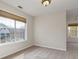 Bedroom with sunlit windows and neutral carpeting, creating a cozy retreat at 1413 Eastbrooke Way, Marietta, GA 30066