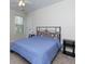 Cozy bedroom with a comfortable bed, soft carpet, and natural light at 1413 Eastbrooke Way, Marietta, GA 30066